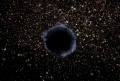 Scoperto un sistema di tre buchi neri